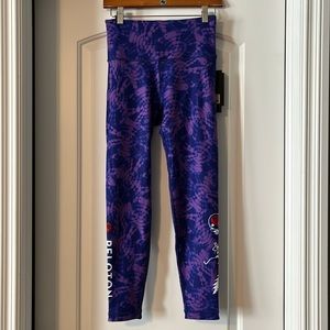 With x Peloton reversible Grateful Dead legging. Limited edition! Sold out! NWT